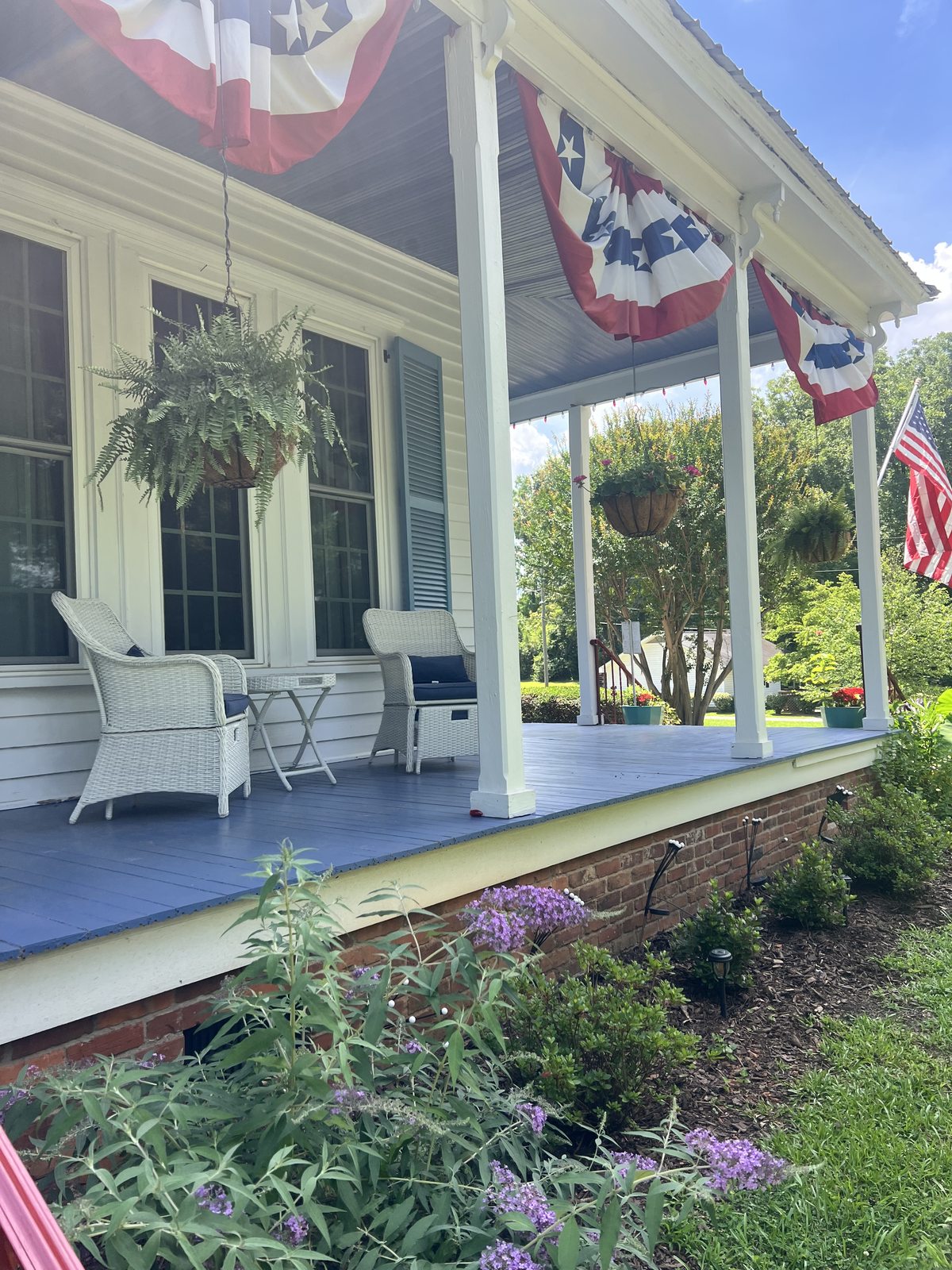 Crowning Glory Farm porch with Bigsly